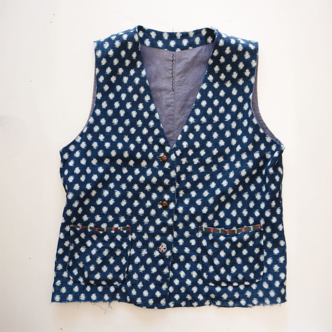 The Fabric That Fell Like Snow: A Taisho–Showa Yukigasuri Indigo Vest and the Life of a Reworked Textile