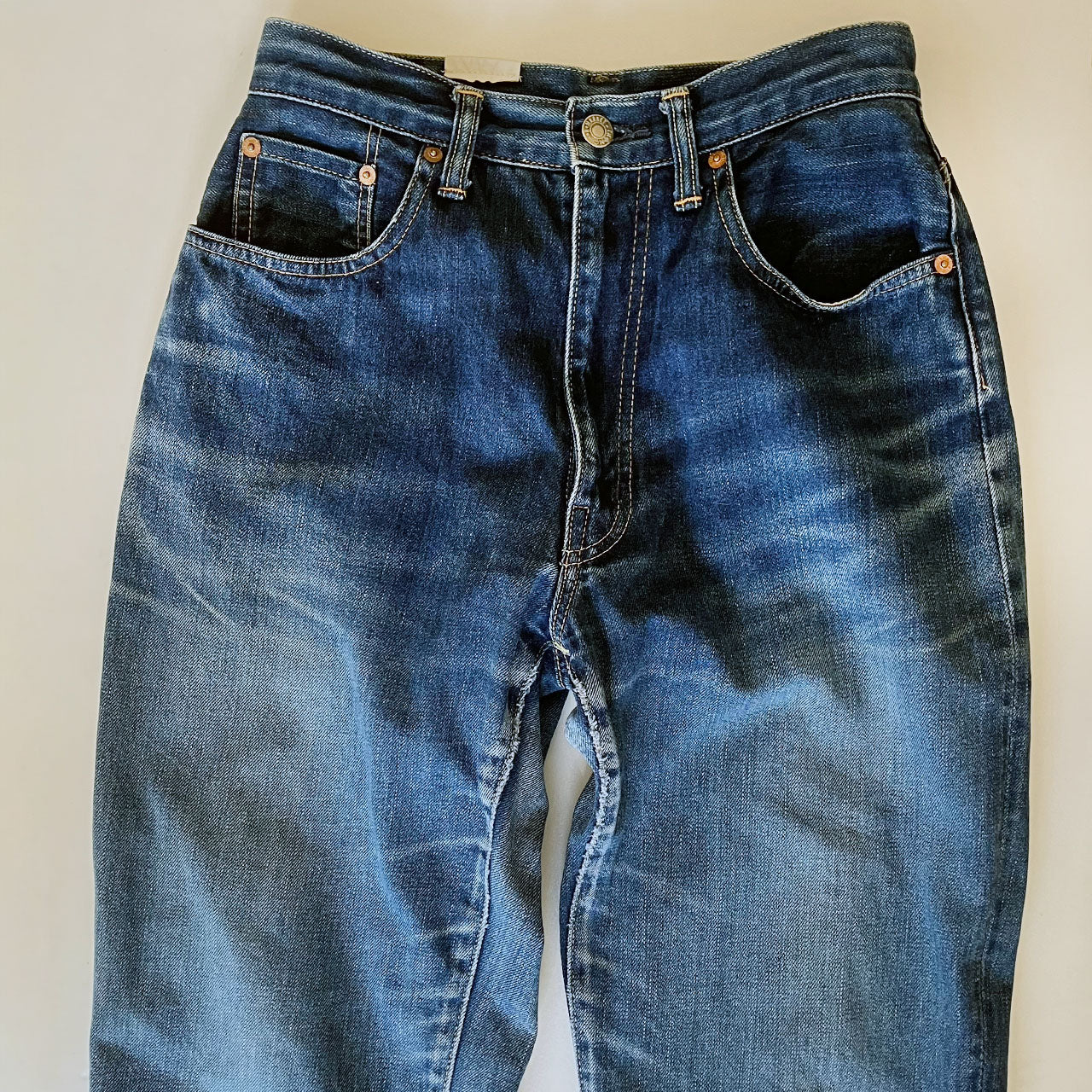 BLUE BLUE indigo denim with visible natural fading throughout