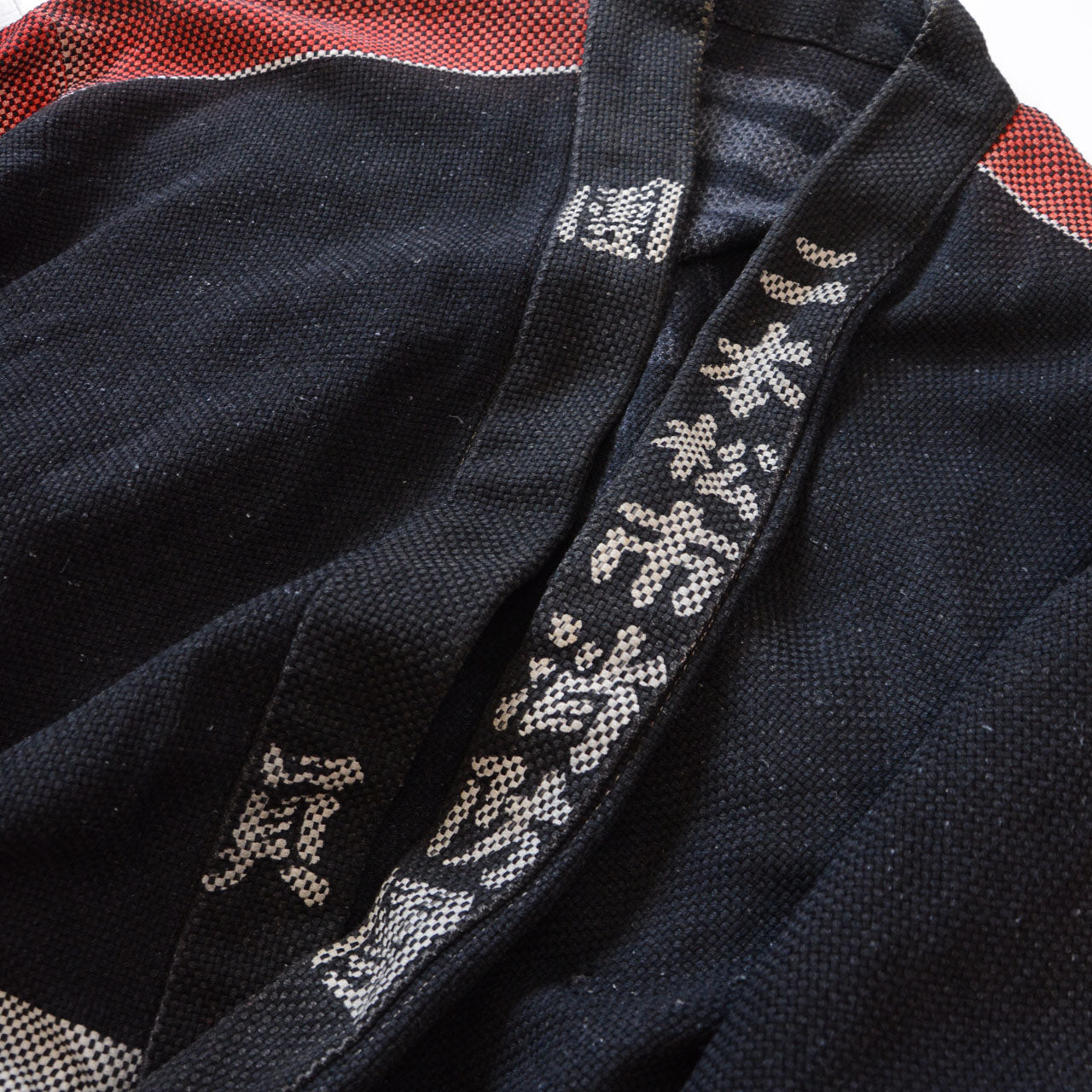 Textured cotton fireman’s jacket showing signs of wear