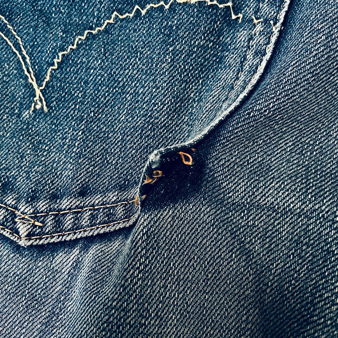 BLUE BLUE indigo denim with oni-hige fading and hem damage