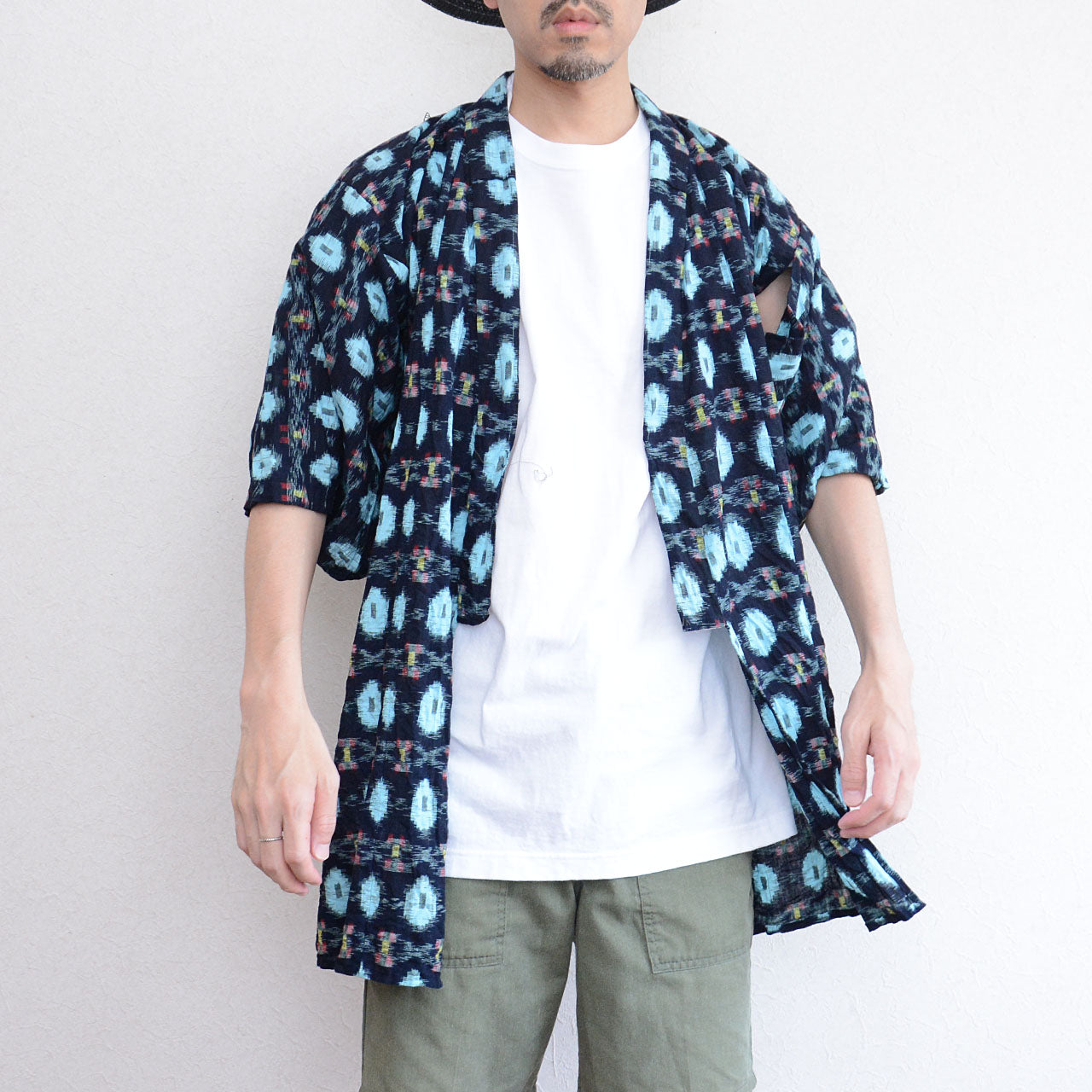 indigo noragi jacket styled with military trousers