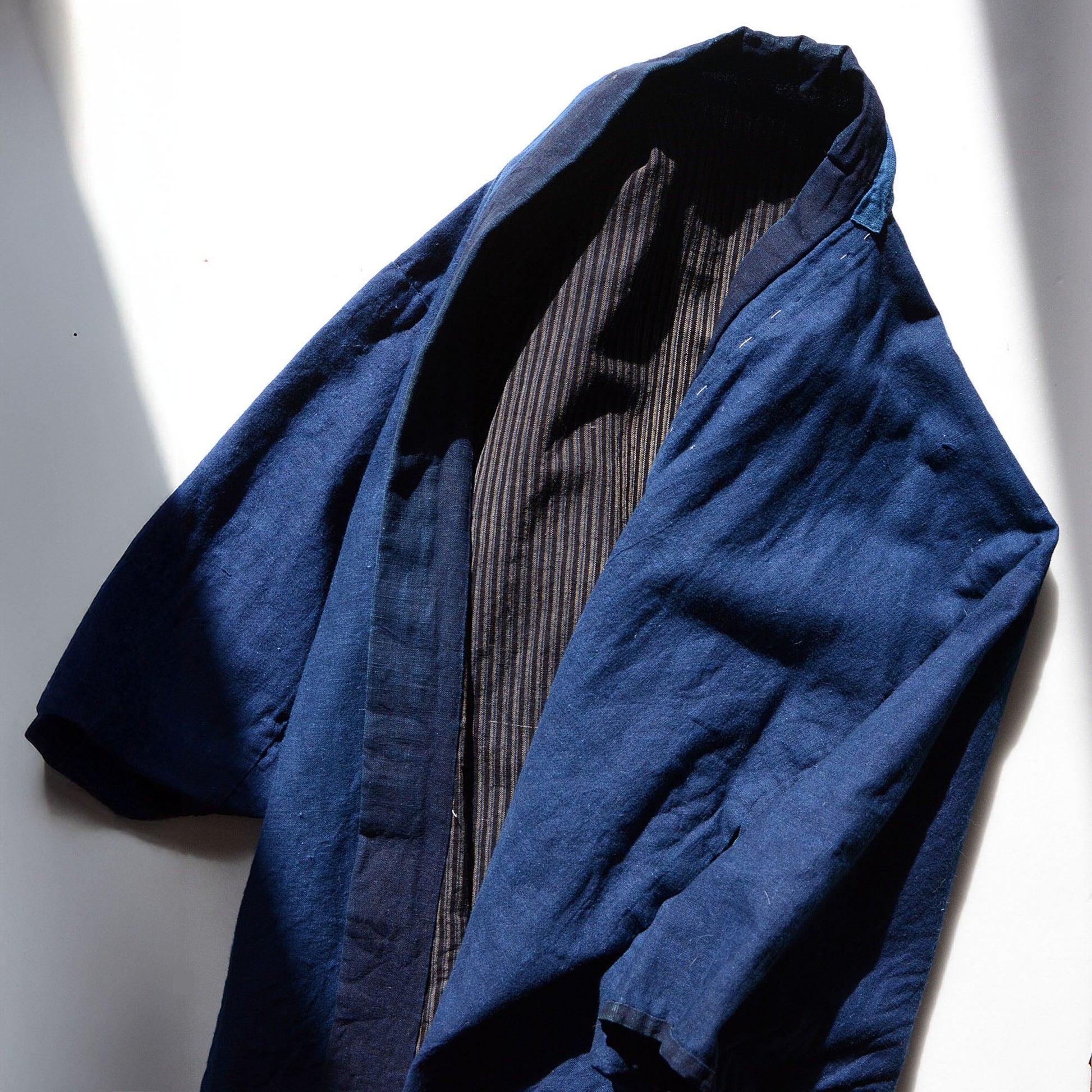 Noragi jacket glowing softly in natural sunlight outdoors