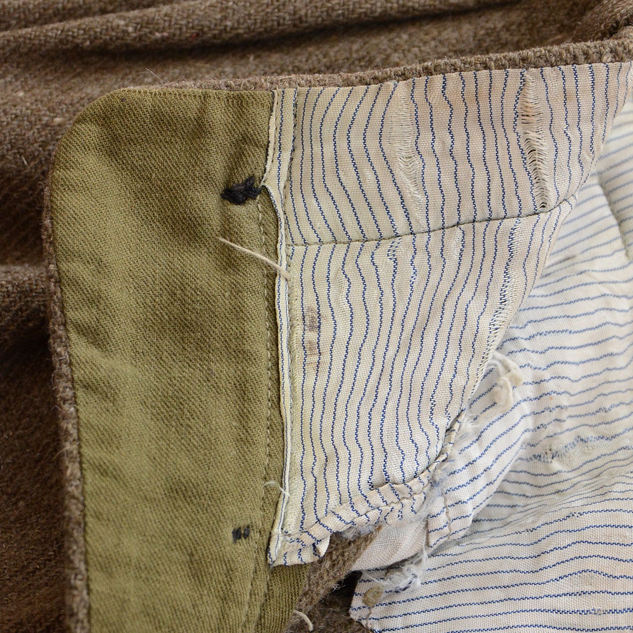 Soft textured wool trousers showing beautiful aging