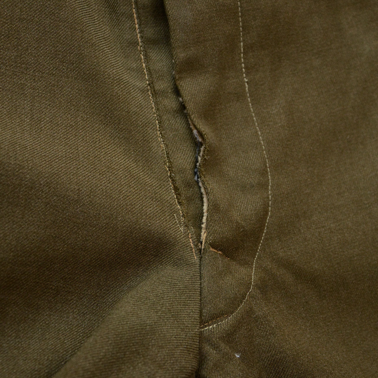 Hand-stitched owner name inside wool military pants