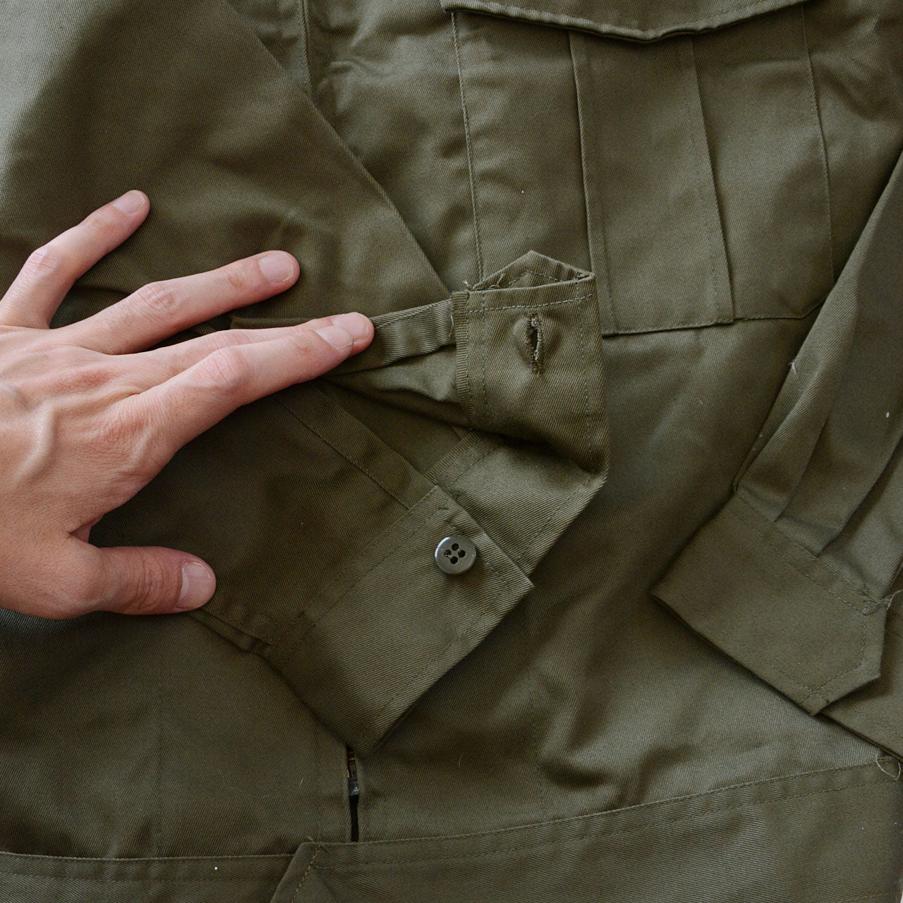olive vintage jacket with boxy proportions