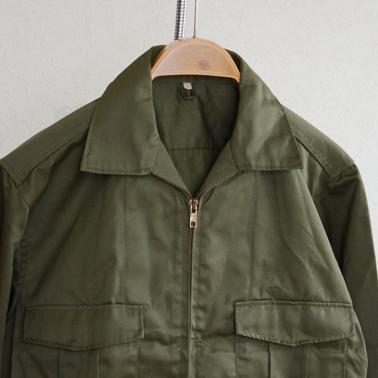 olive green vintage jacket with simple design