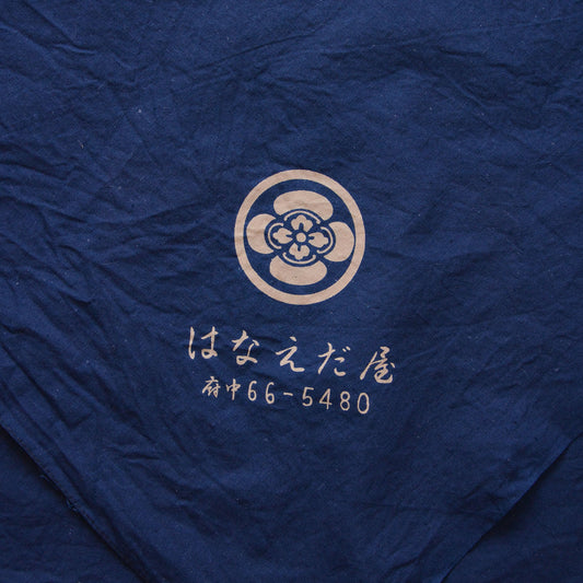 Vintage Japanese cotton furoshiki with traditional crest pattern