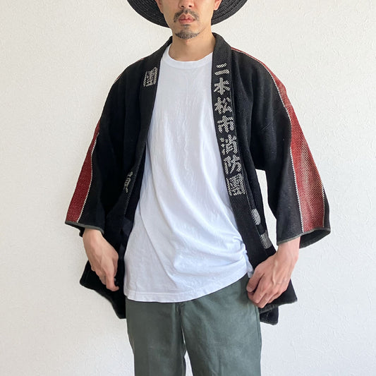 Vintage Japanese firefighter jacket with bold kanji back