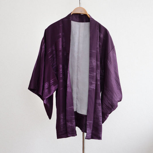 Vintage Japanese haori jacket displayed flat on a neutral background