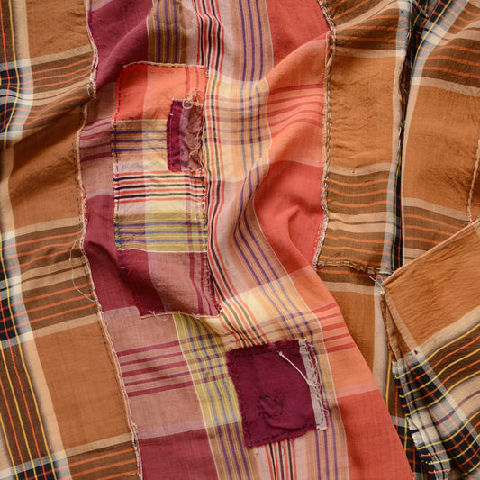 Vintage mid-Showa era cotton futon cover with plaid patchwork and hand-stitched repairs