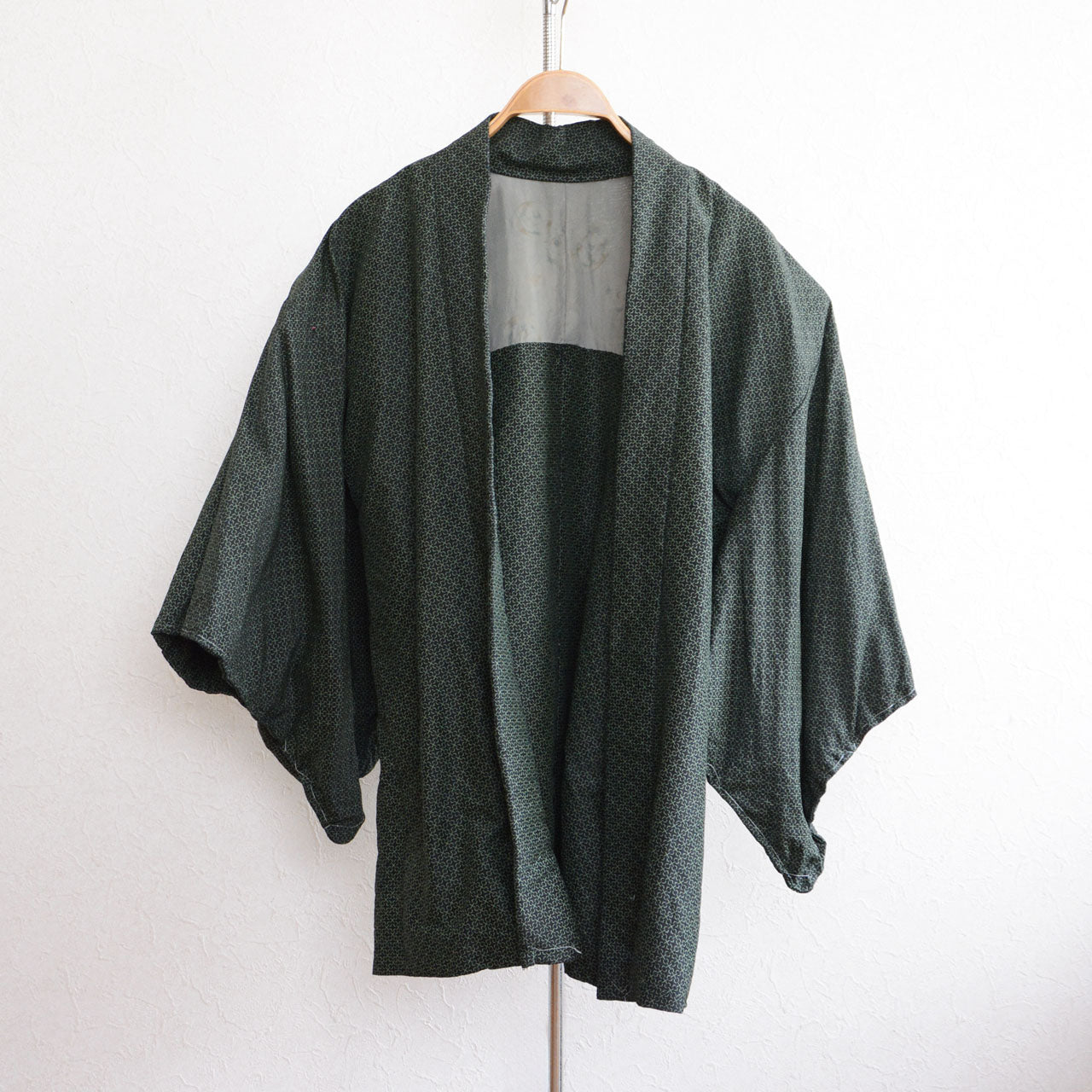 Vintage women’s haori with deep green base and fine komon-style pattern