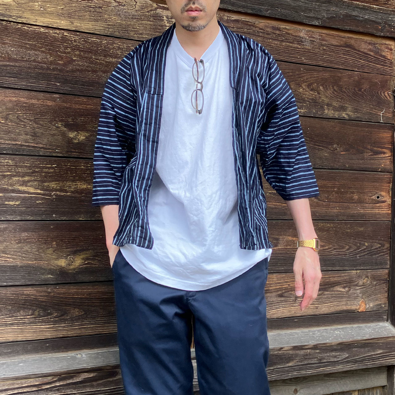 Man wearing a vintage Japanese noragi jacket, showcasing the fit and style of the garment.