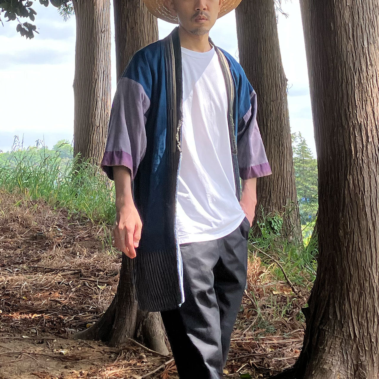 Layered Noragi with rustic textures and asymmetrical cutsLayered Noragi with rustic textures and asymmetrical cuts