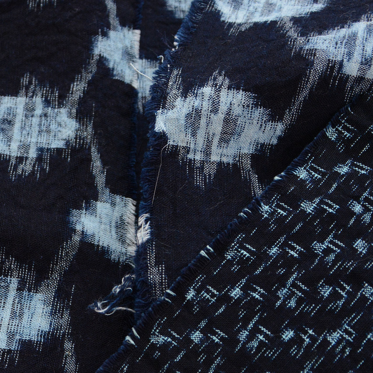 Japanese boro sashiko fabric scraps in indigo-dyed kasuri pattern for handmade crafts