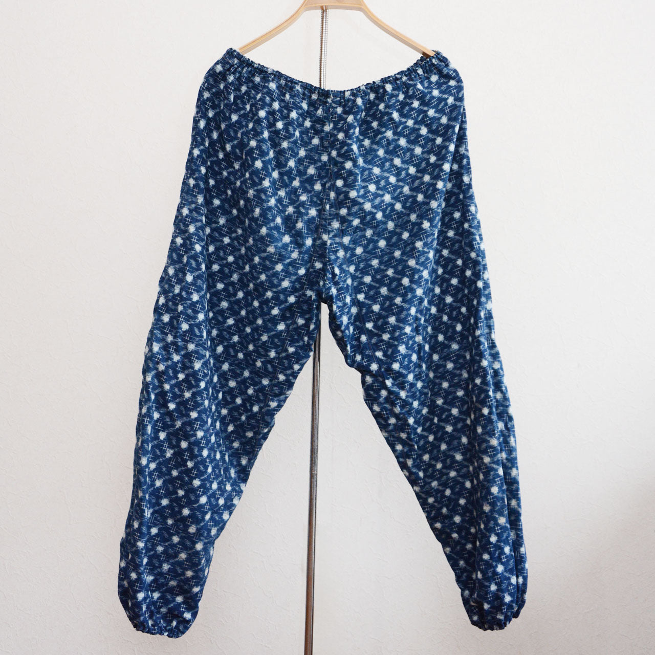 Vintage Japanese workwear pants with faded indigo and visible stitching