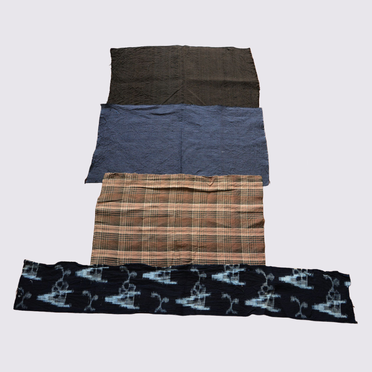 Four pieces of assorted Japanese cotton fabric for handmade projects