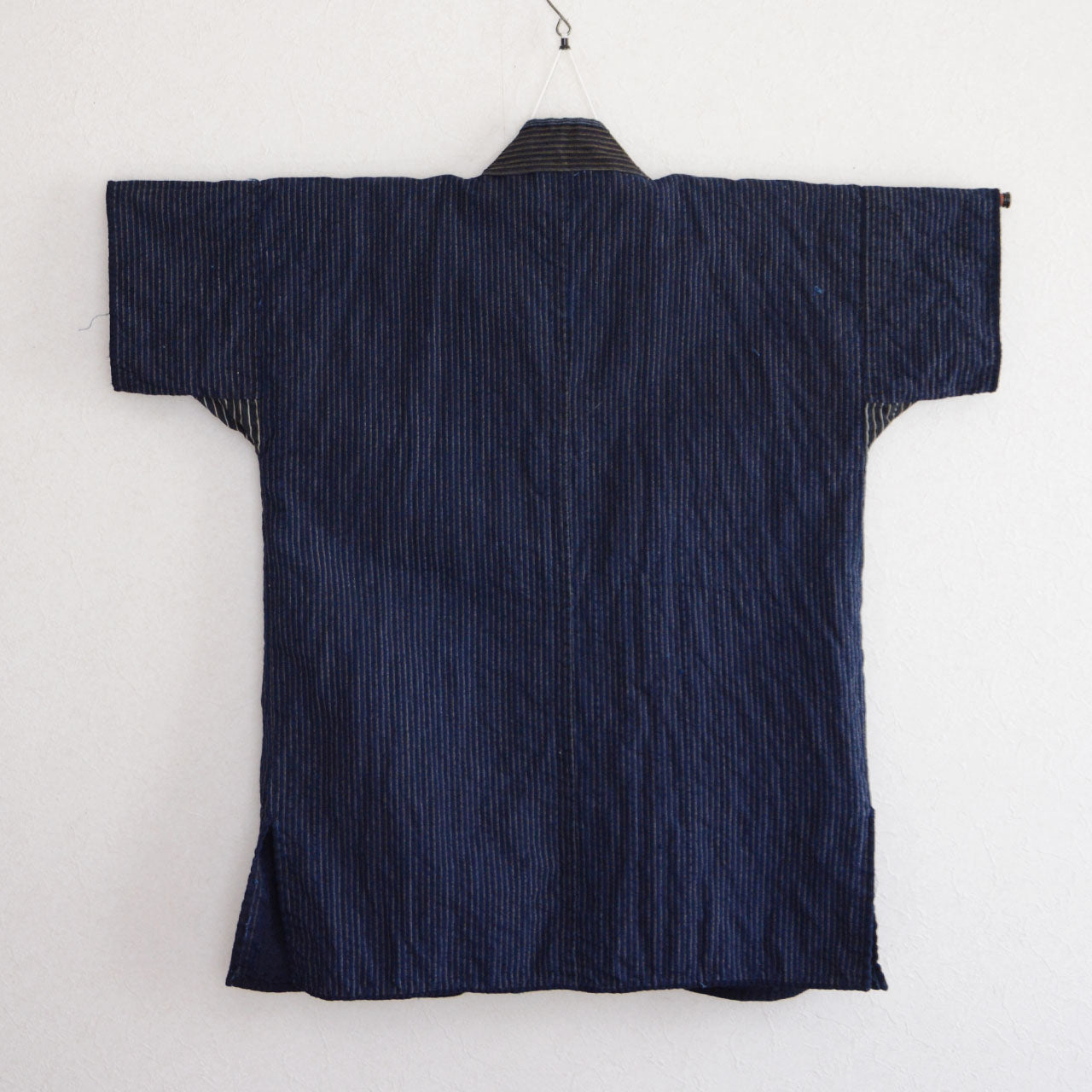 Traditional Japanese Workwear with Visible Sashiko Repairs