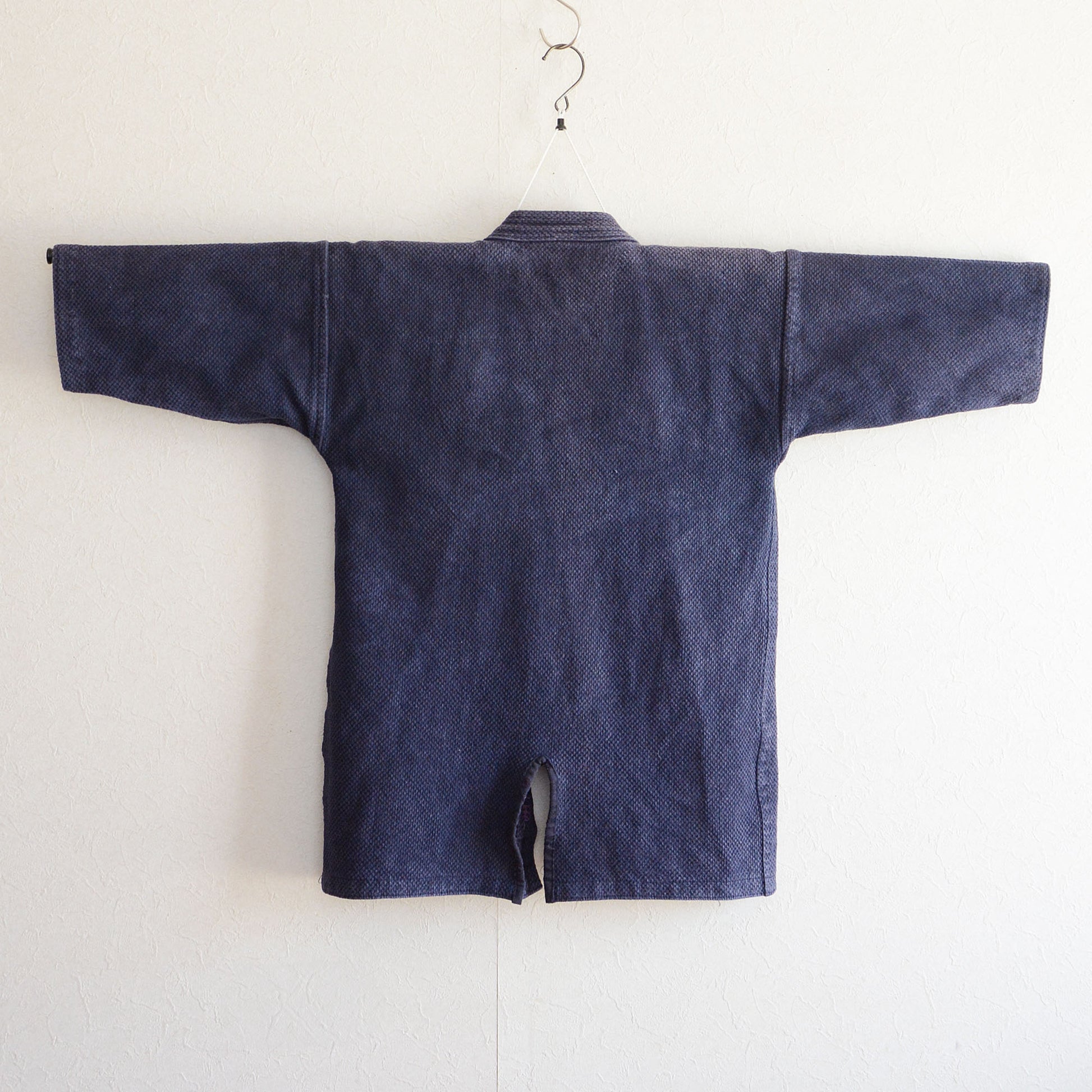 Kendo jacket with worn-in charm, crafted from cotton.