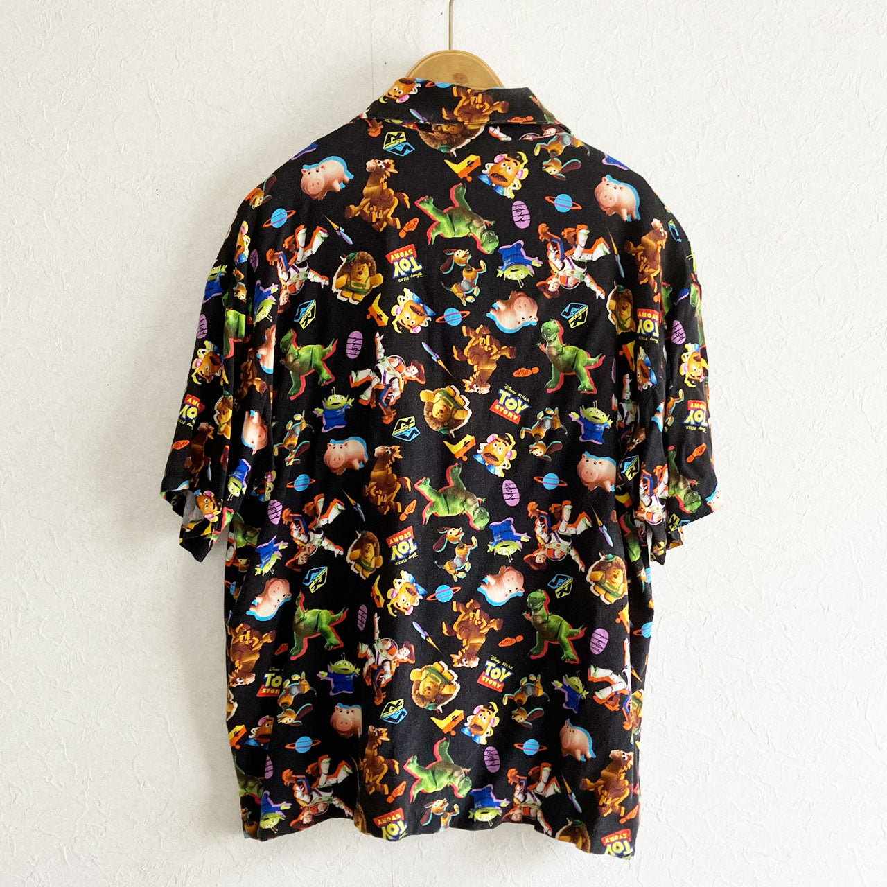 Disney Pixar Toy Story short sleeve shirt, black base with character print, Japan exclusive, size M