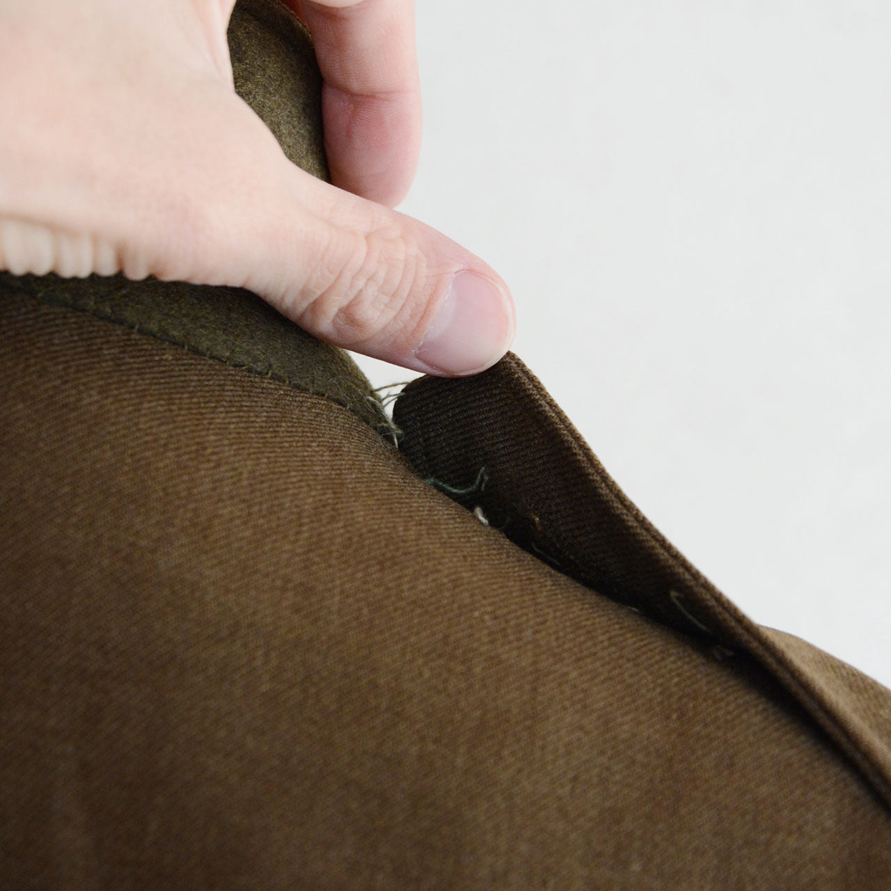 A U.S. Army officer jacket with postwar hardware reconfiguration.