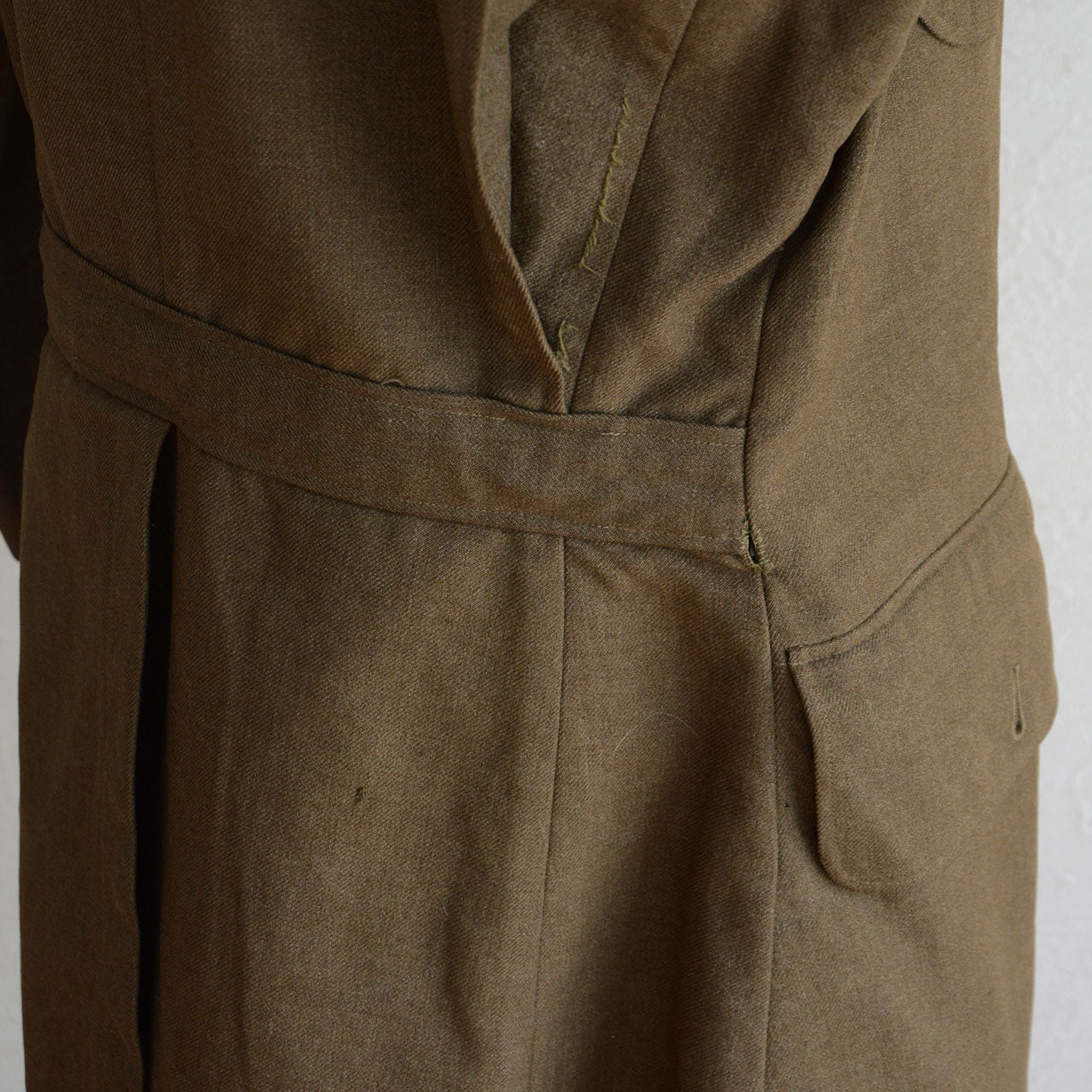 A U.S. Army officer jacket adapted for institutional and workwear reuse.