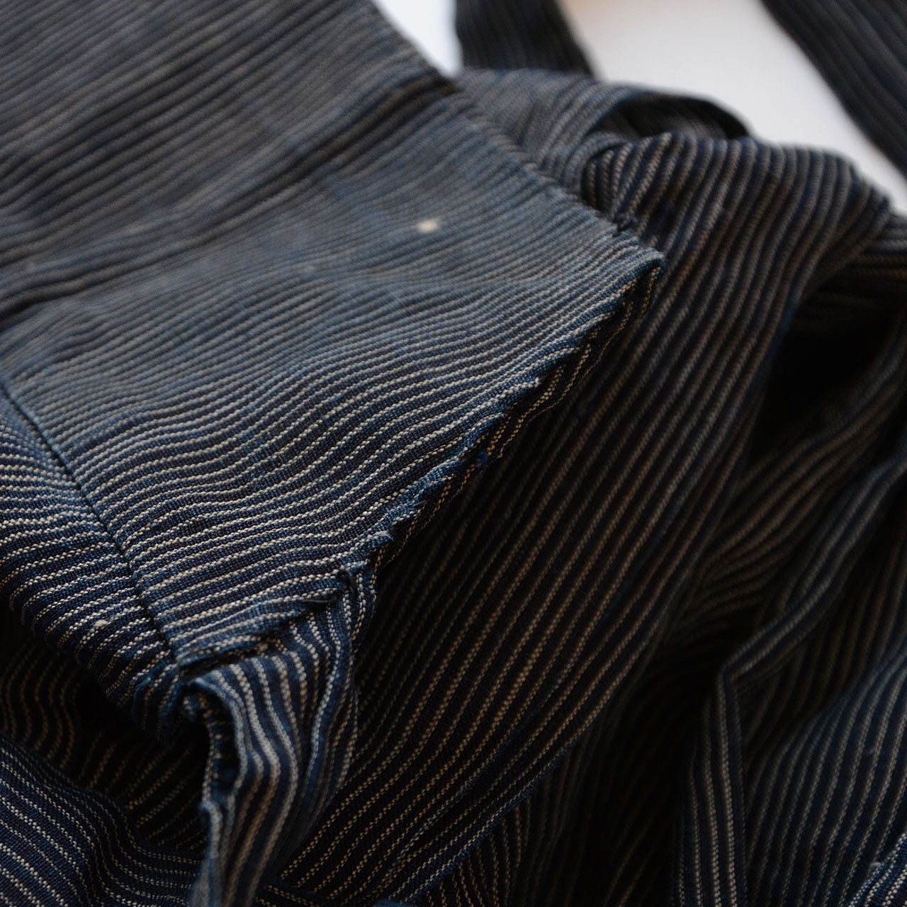 Deep indigo blue Japanese fabric with natural fading and texture