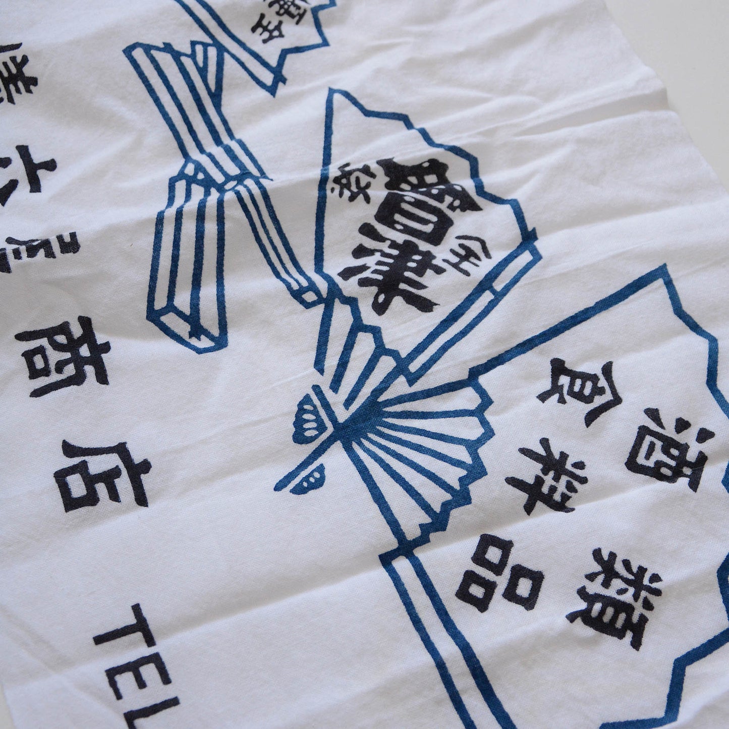 Japanese tenugui towels at a store selling alcoholic beverages and other items