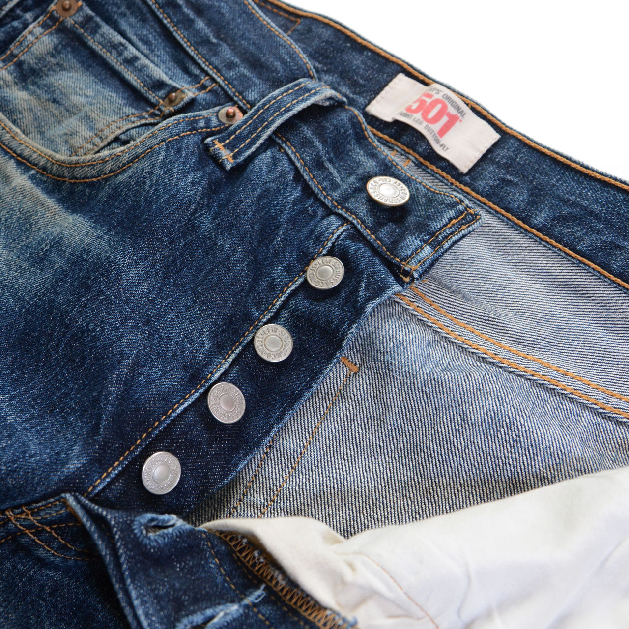 Levi's 501, honeycomb fade pattern at knee area, faded blue cotton denim, vintage wear
