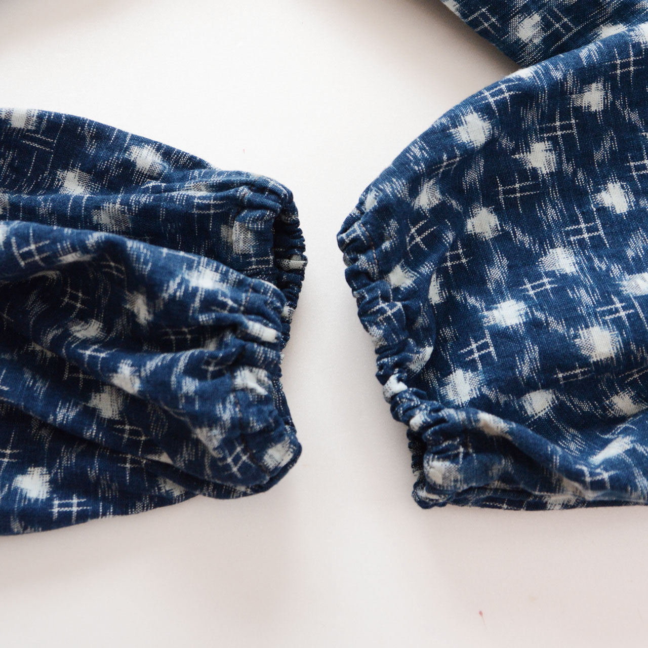 Indigo kasuri pants with elastic waist and cuffs for comfortable daily wear