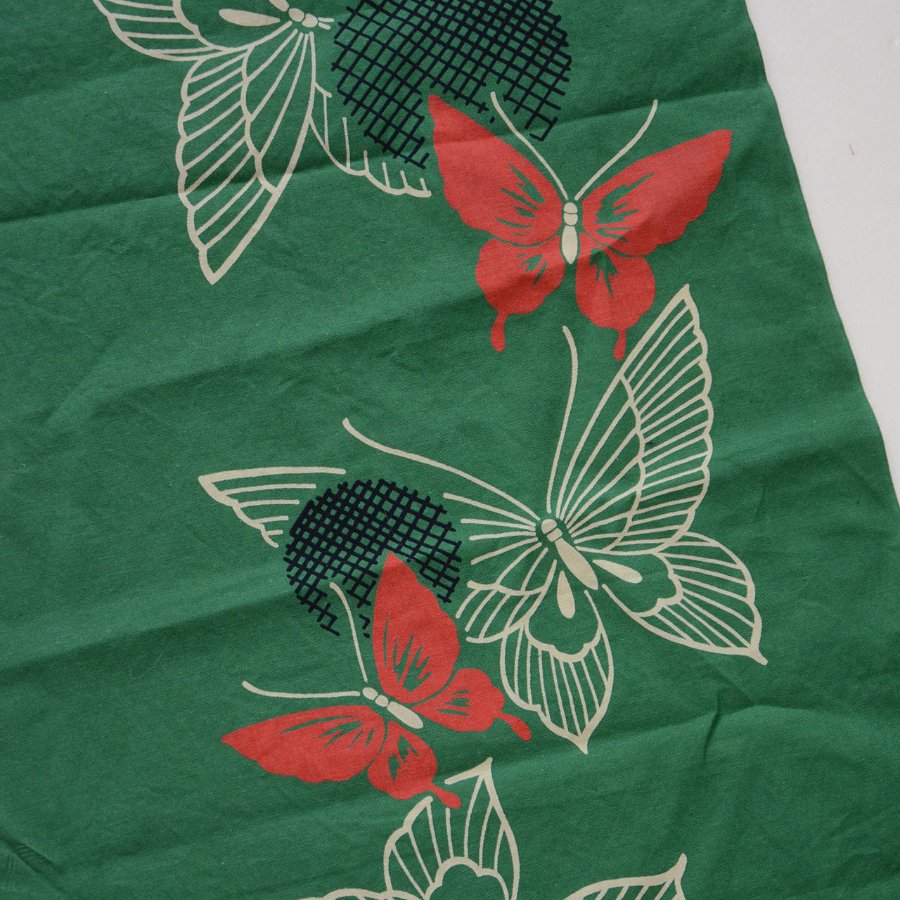 Textile remnant featuring classic Japanese butterfly design for sewing and crafts