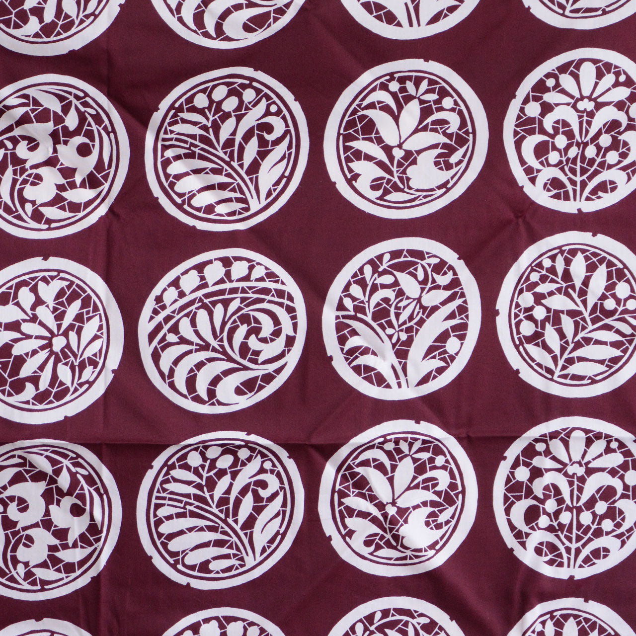 Japanese furoshiki with family crest-inspired botanical pattern