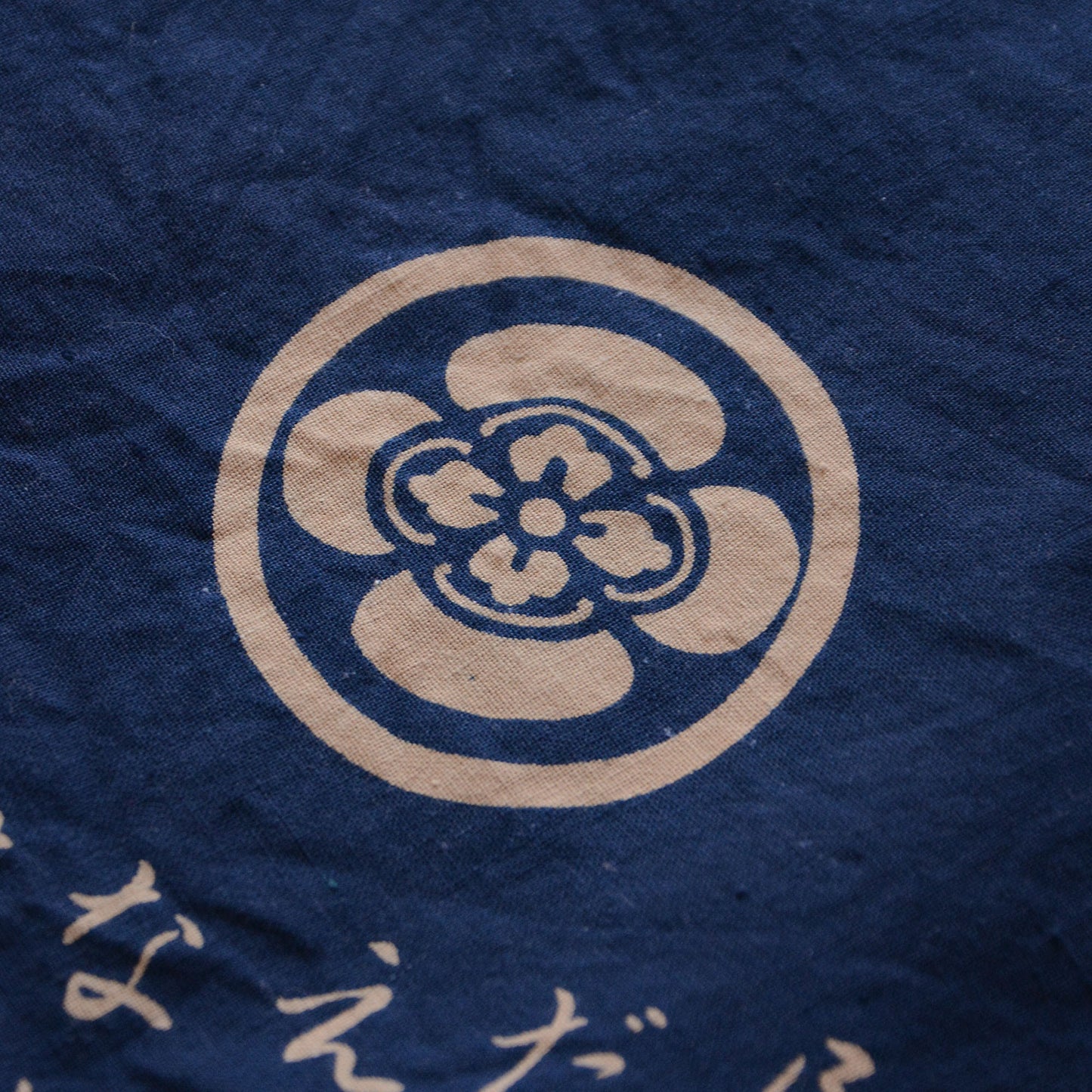 Retro Japanese furoshiki with decorative crest motif