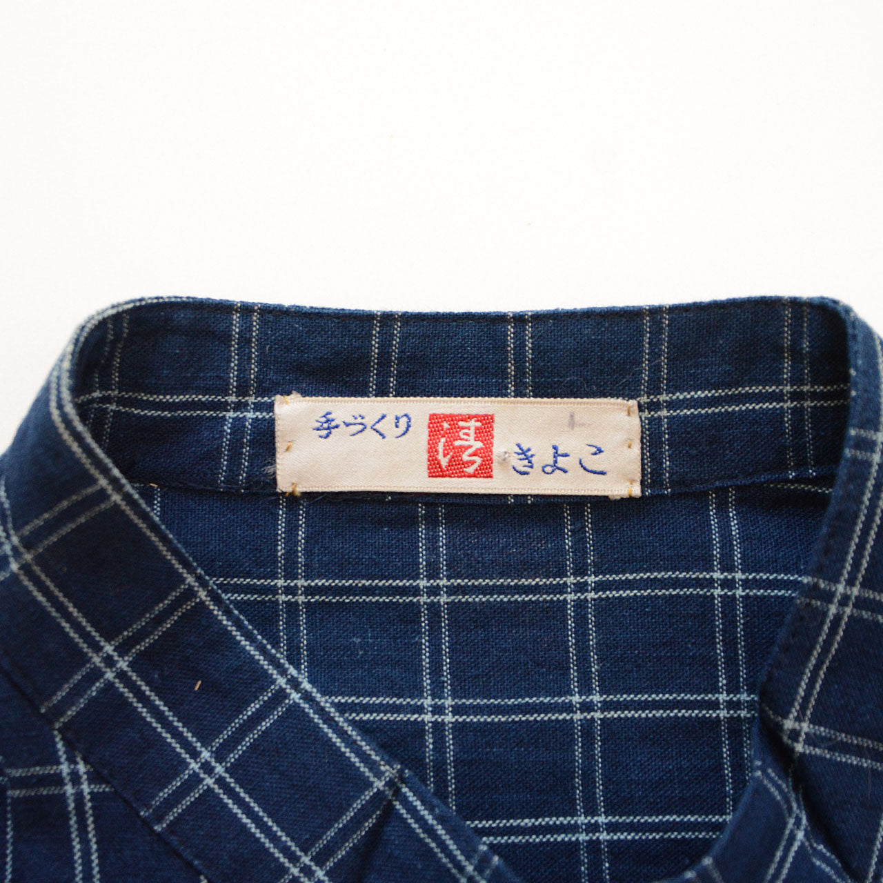 Minimalist band collar shirt with soft indigo tones