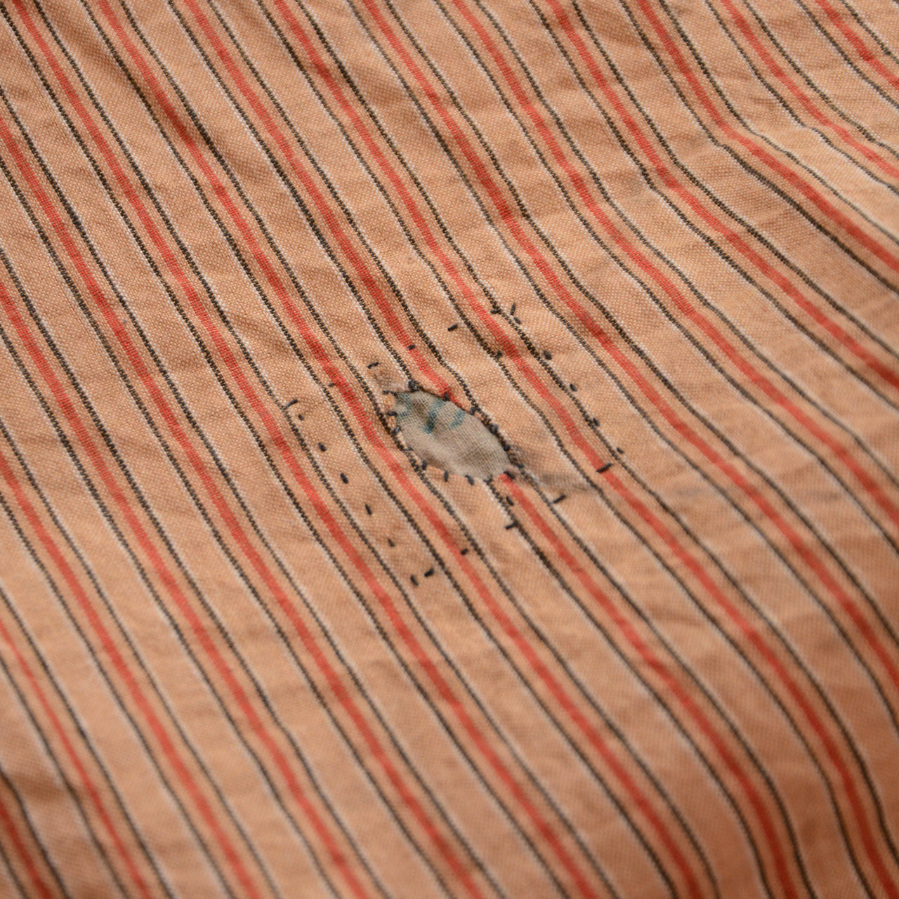 Hand-repaired Japanese boro cloth with stripes