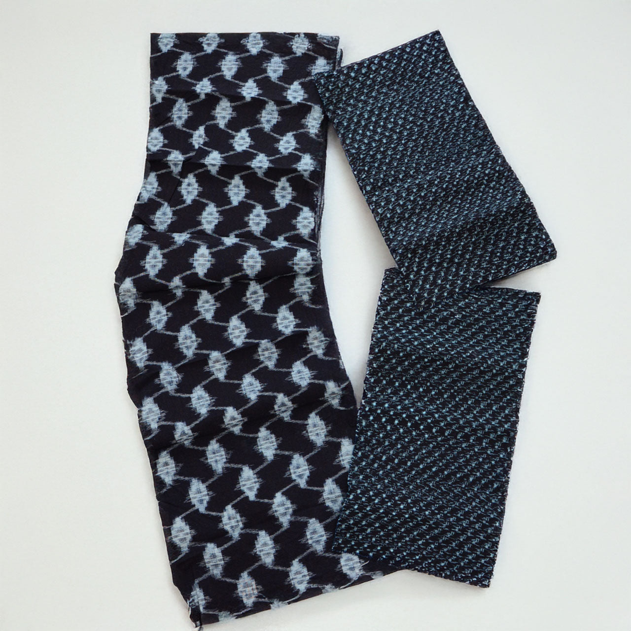 Japanese vintage indigo kasuri cloth with visible wear and traditional charm
