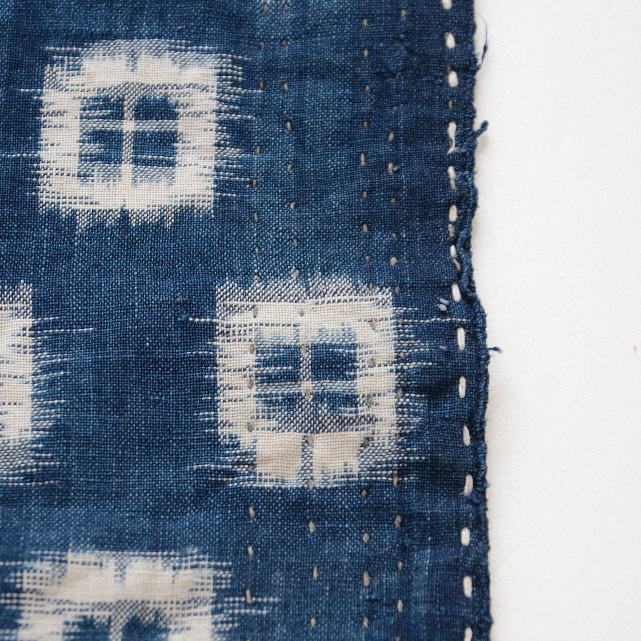 Antique Japanese cotton fabric with sashiko embroidery indigo kasuri pattern