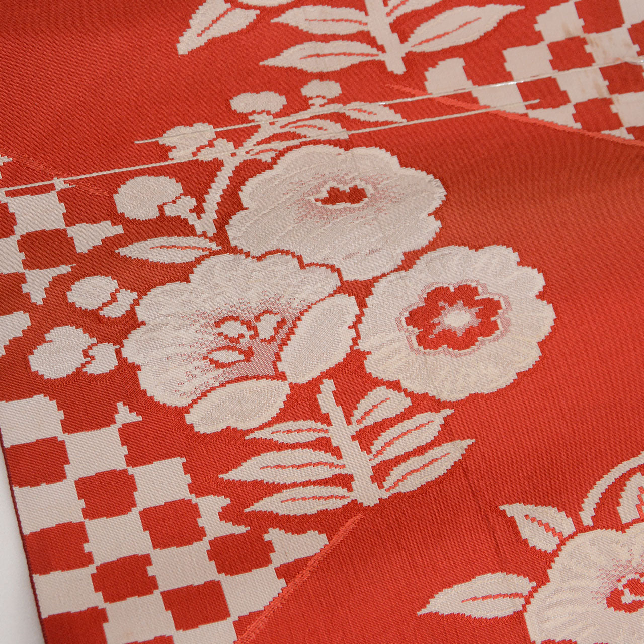 Patterned silk textile from a Japanese vintage obi with floral elements