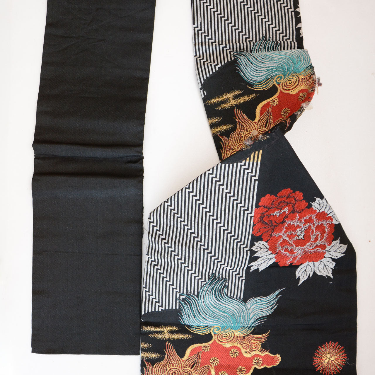 Antique Nagoya obi fabric from Japan with decorative motifs