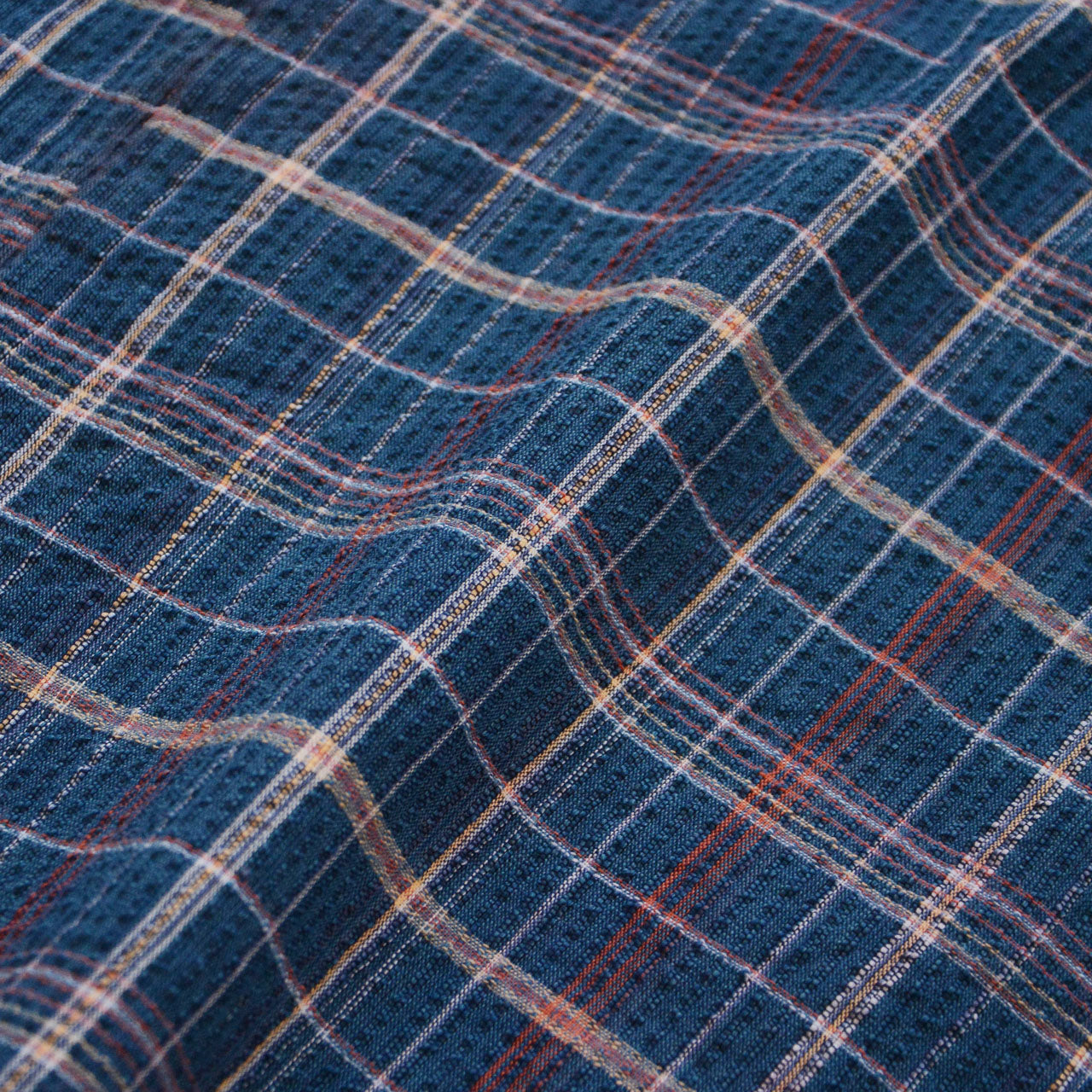 Minimalist Japanese outerwear with practical details and relaxed fit