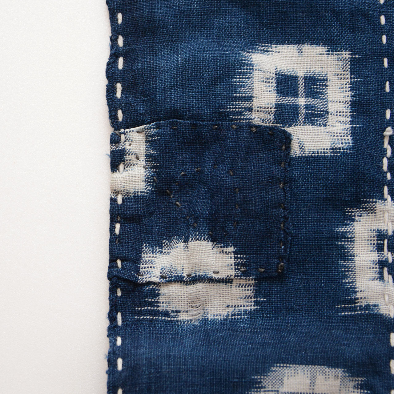 Japanese vintage remnant textile with patches and hand-stitched sashiko detail