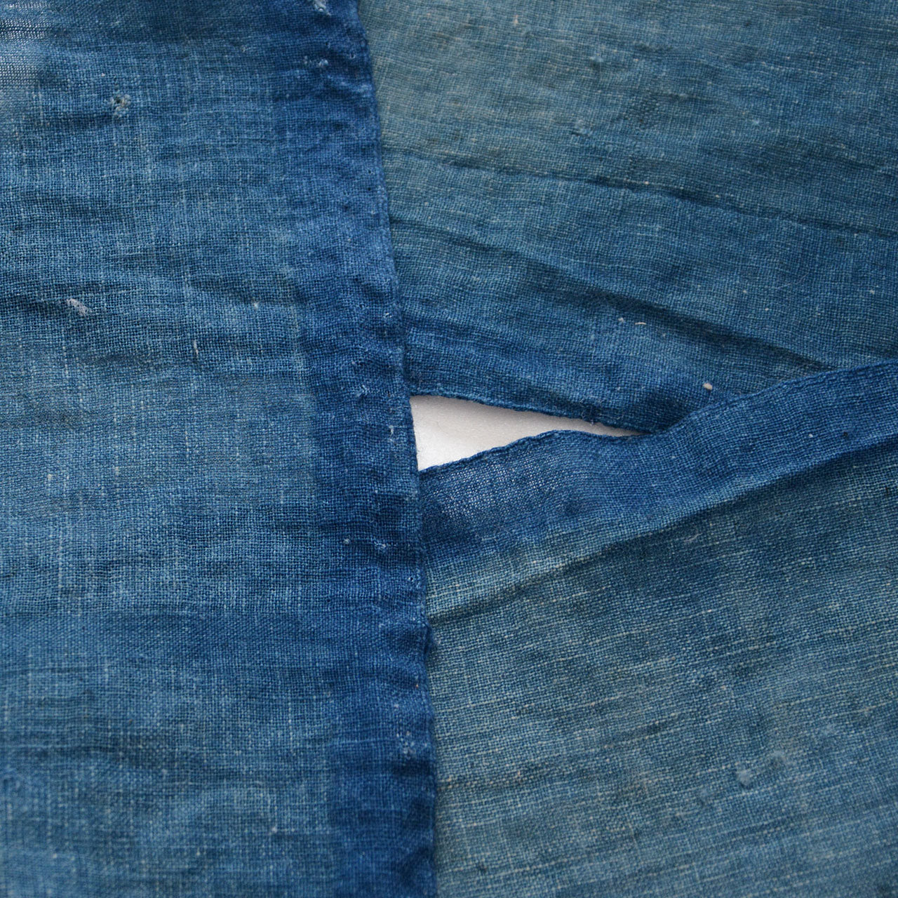 Four pieces of vintage boro-style indigo cotton fabric