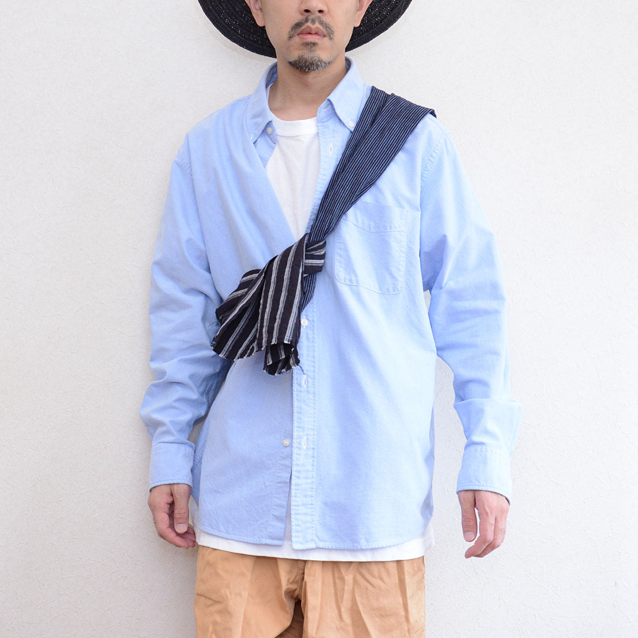 Soft aged cotton stole styled with casual fashion wear