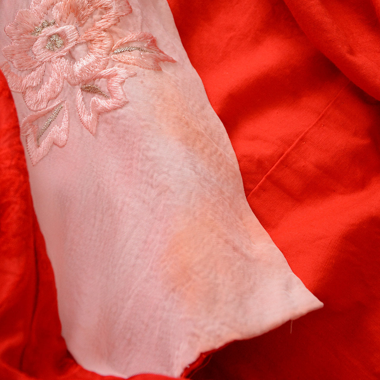 Traditional crane motif embroidery on red vintage juban