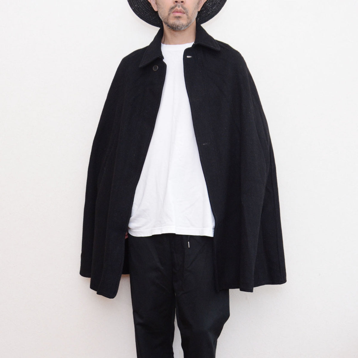 Front of black wool Bankara mantle worn by 171 cm model
