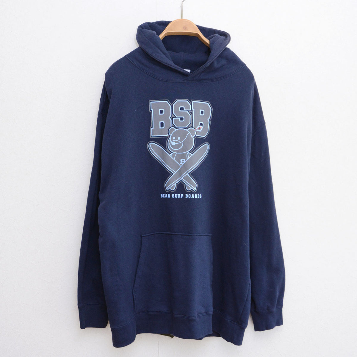 Navy BEAR SURFBOARDS hoodie with front bear graphic and kangaroo pocket