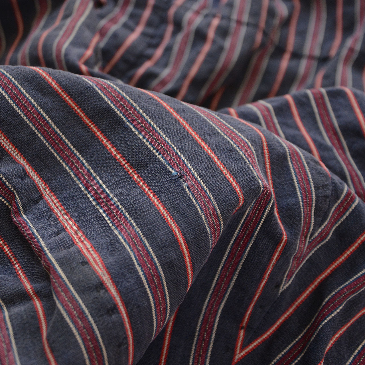 Worn and repaired monpe pants suitable for vintage fashion lovers