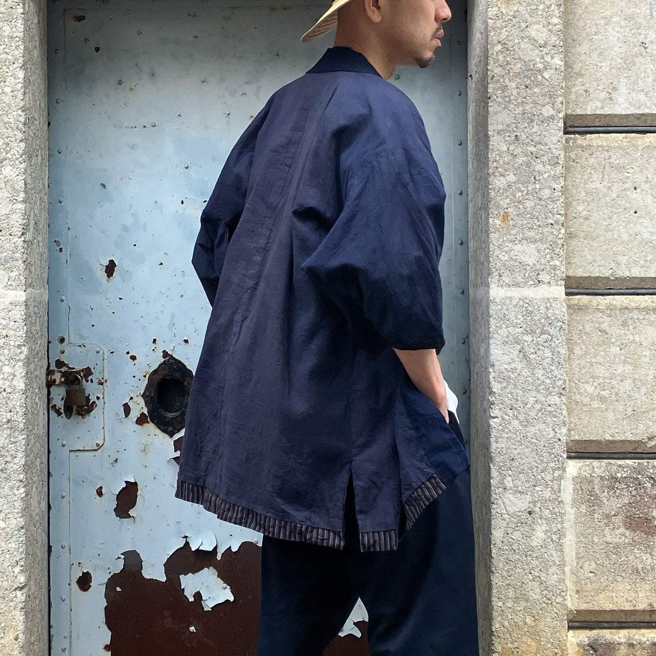 Traditional Noragi jacket with indigo neckline paired with faded cotton stripes