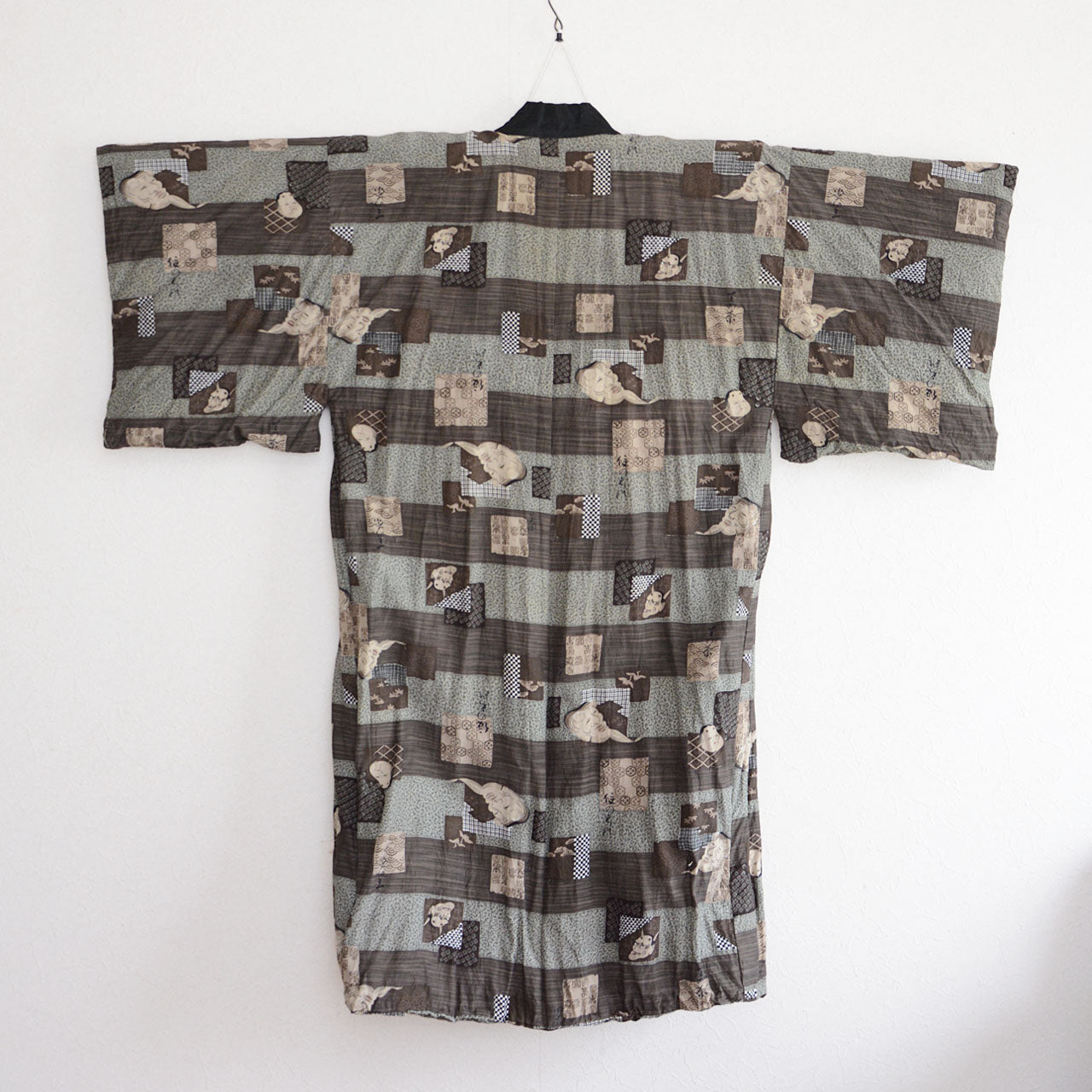 Retro Japanese loungewear kimono with theatrical and symbolic patterns