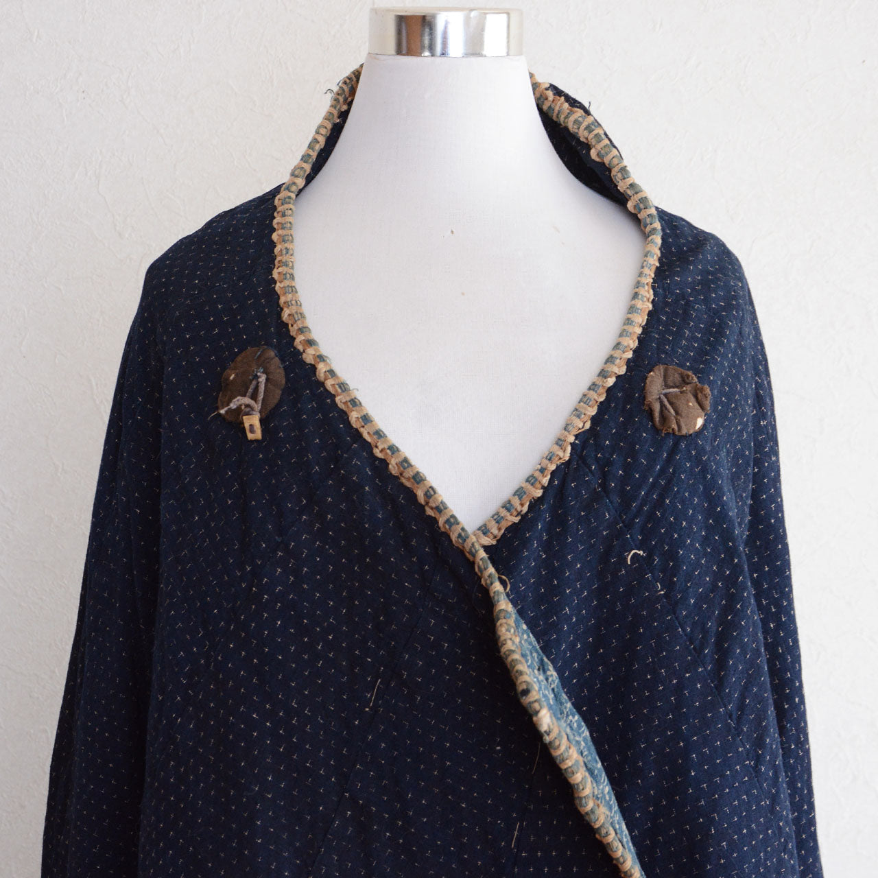 A vintage Japanese cotton garment with indigo dyeing.