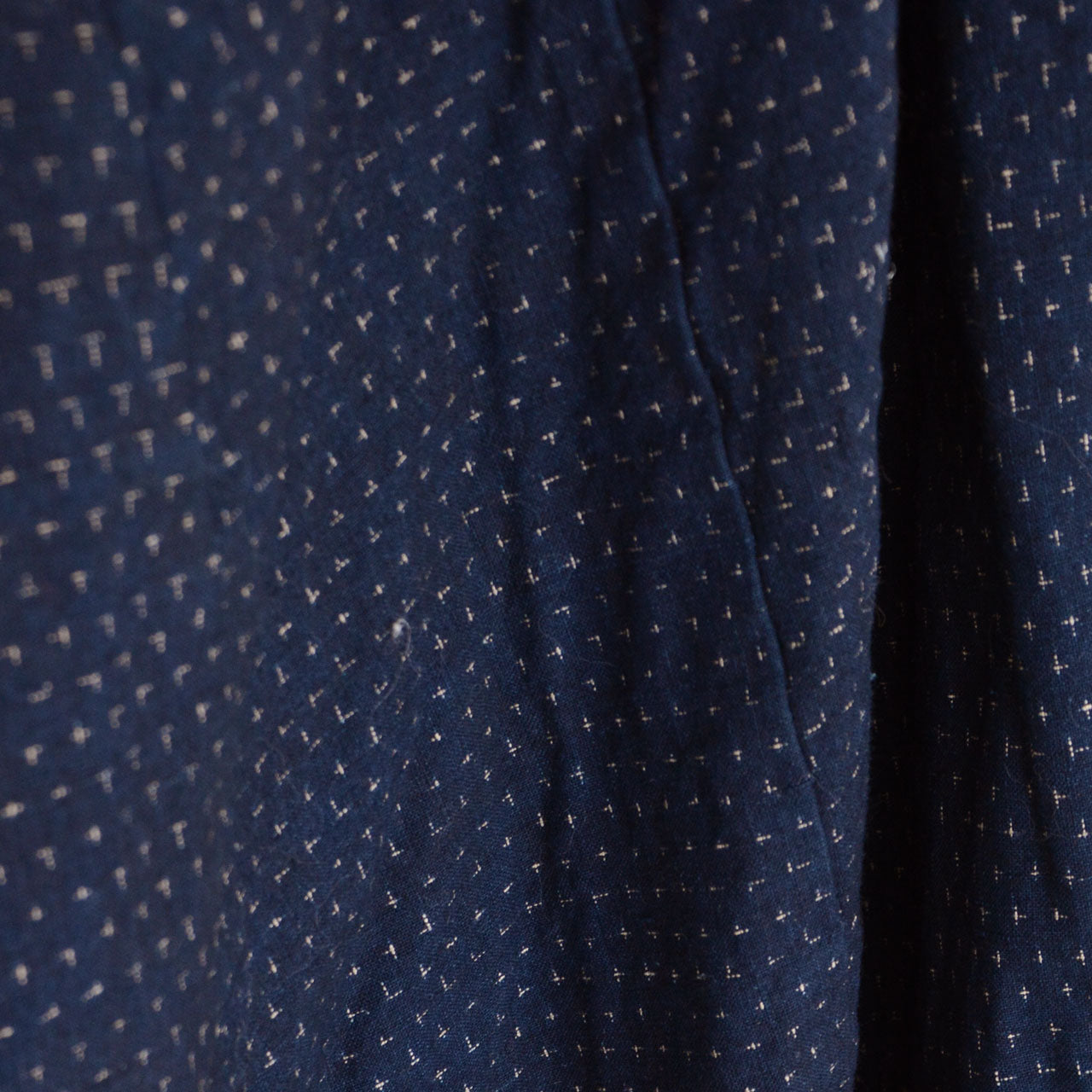 A historical Japanese indigo-dyed dochu kappa from the late Edo period.